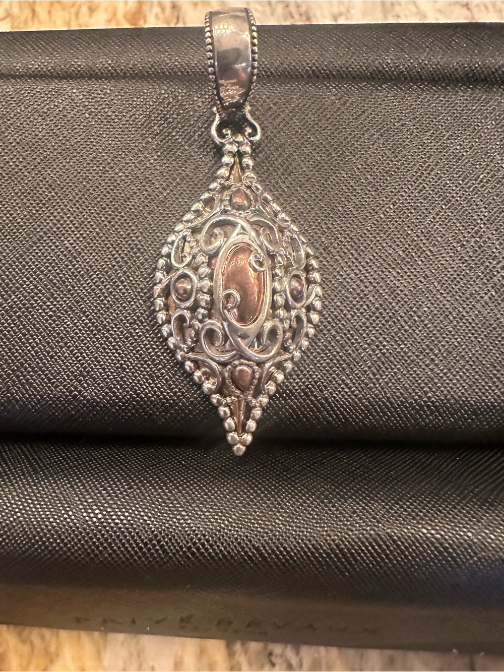 Ornate Silver Filigree Teardrop Pendant with Pink Accent by Carolyn Pollack